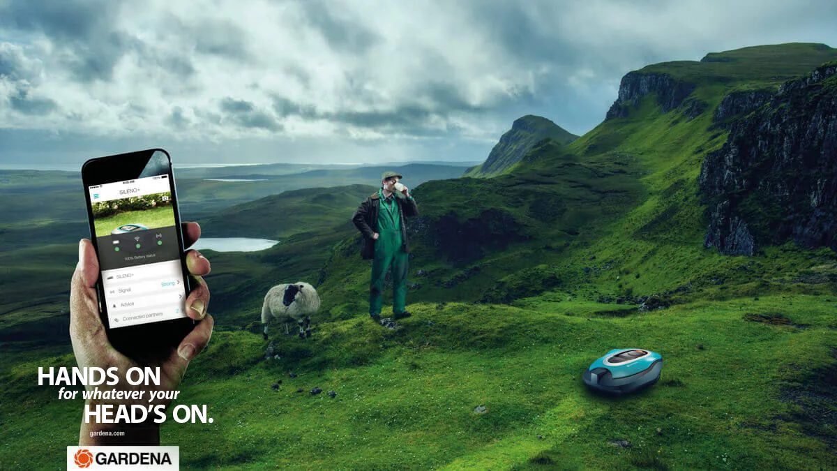 Advertising poster for Gardena gardening tools showing a Scottish gardener using a robot to mow the highlands